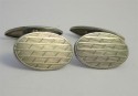 Boutons de manchette a faces guillochées en maillechort 1930